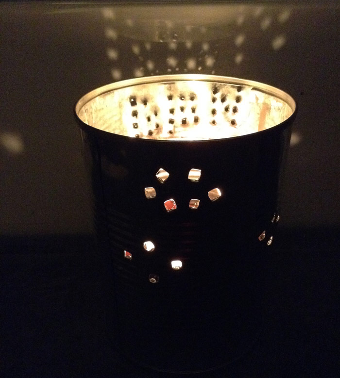 Tin Can Candle shines