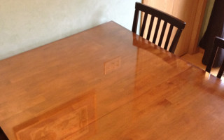 We put a glass top on our wooden kitchen table